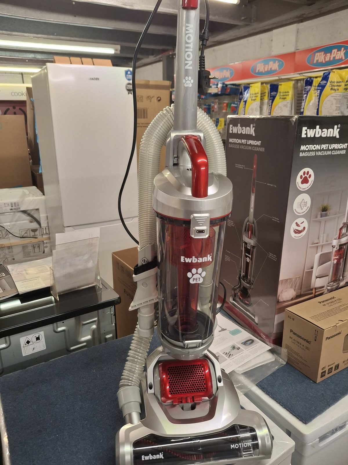 An Ewbank upright vacuum cleaner on display in the shop